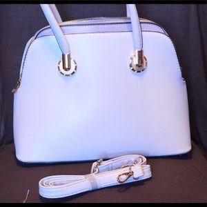 Tan and light purple purse